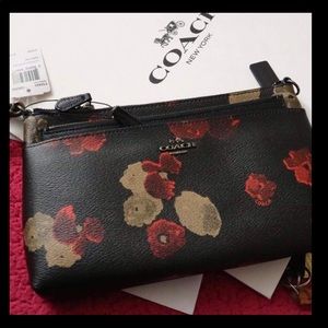 Brand new coach clutch/wristlet